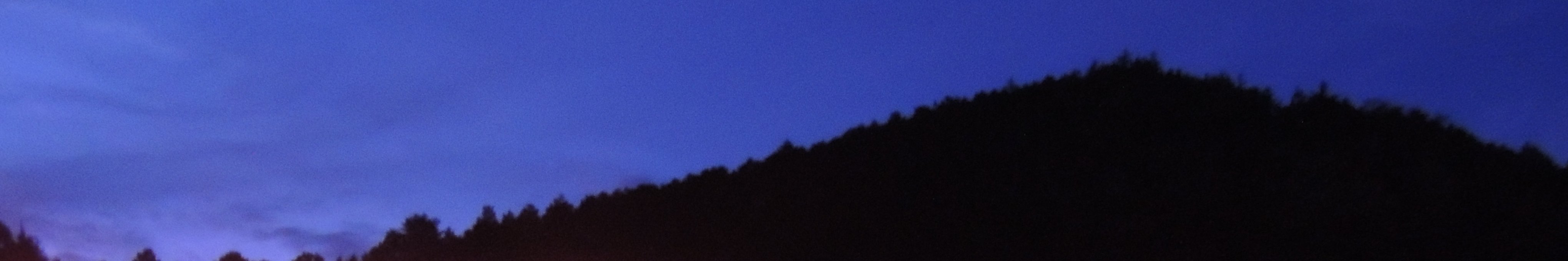 初期夜間急病診療(写真:東白川村の風景/夕暮れ時の空と山)